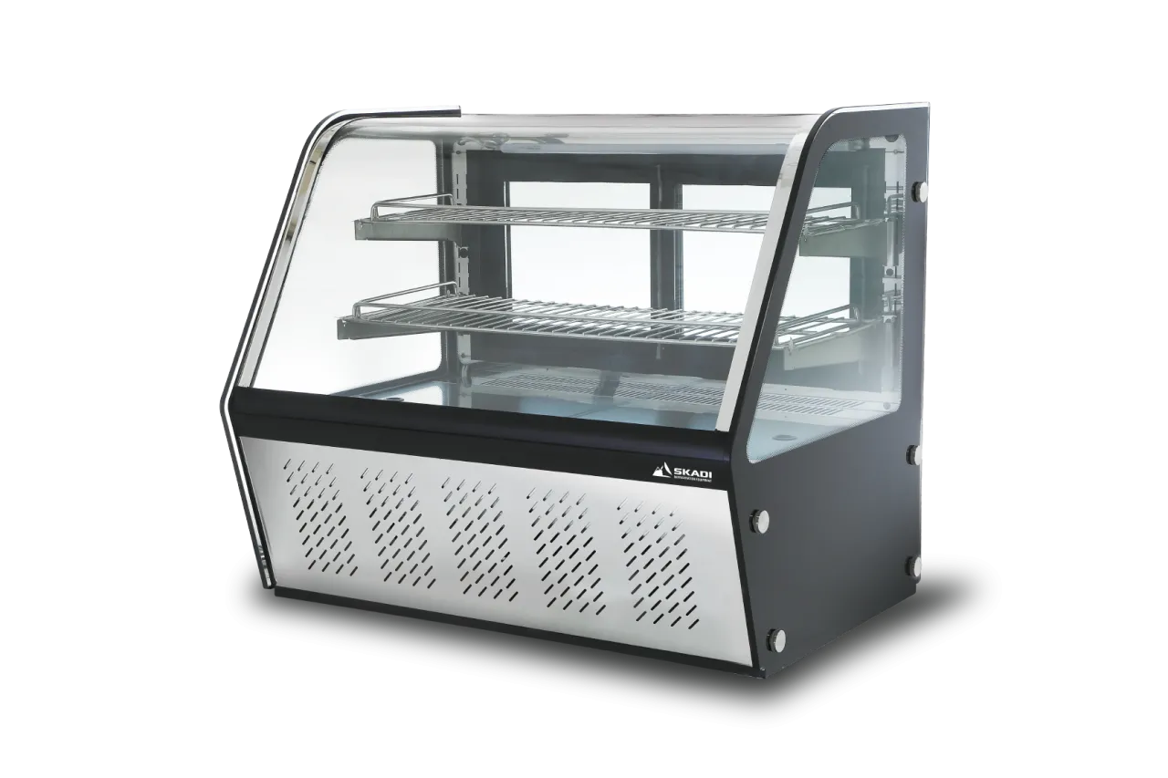 Durable Countertop Commercial Cake Display Cabinet | CTSCO8 featuring a compact, black design with two wire shelves, enclosed in glass for visibility and preservation of baked goods.