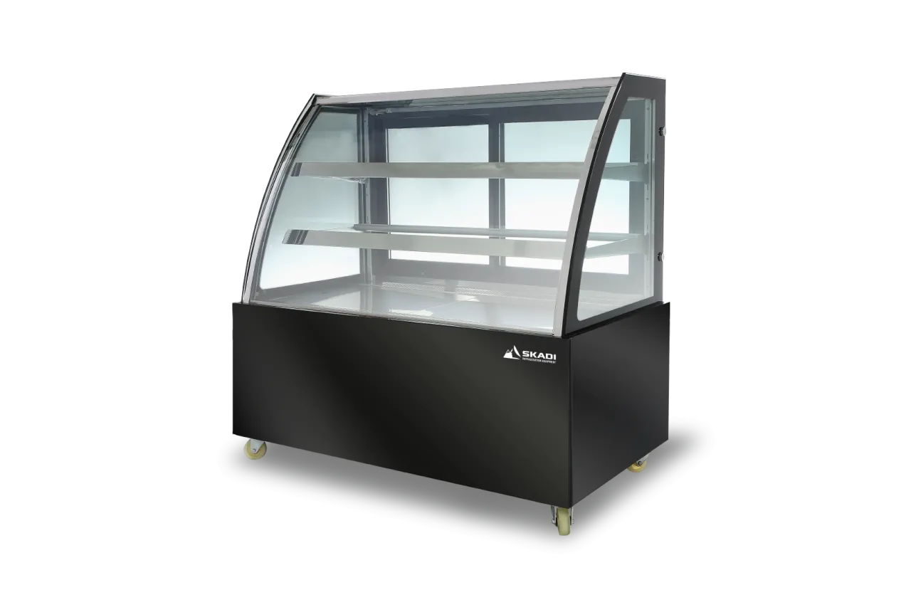 Image of a black Skadi refrigerated display case with curved glass, featuring two shelves for showcasing products.