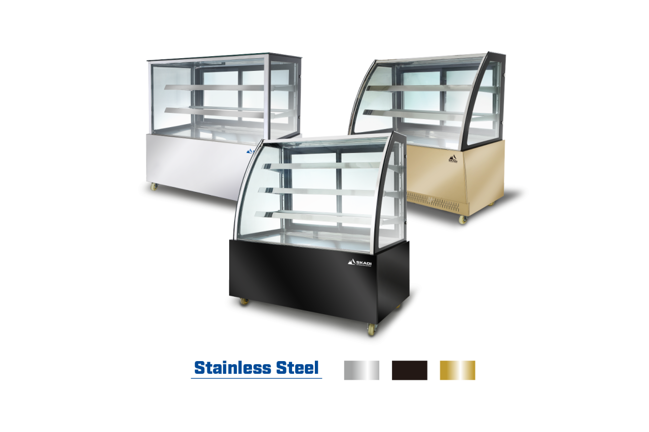 SKADI LTC-D series cake display refrigerator available in multiple finishes, including stainless steel, black, and gold, ideal for displaying food items in commercial settings.