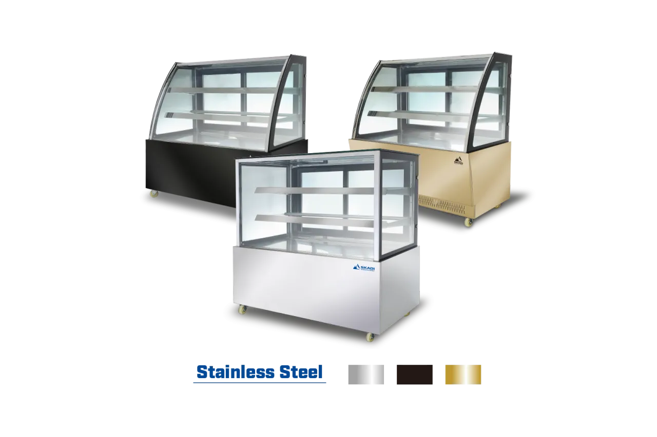 Three refrigerated display cabinets by Skadi in different finishes: black, stainless steel, and gold. The image shows the color options and design variations for the same model, emphasizing the customizable exterior for retail or foodservice environments.