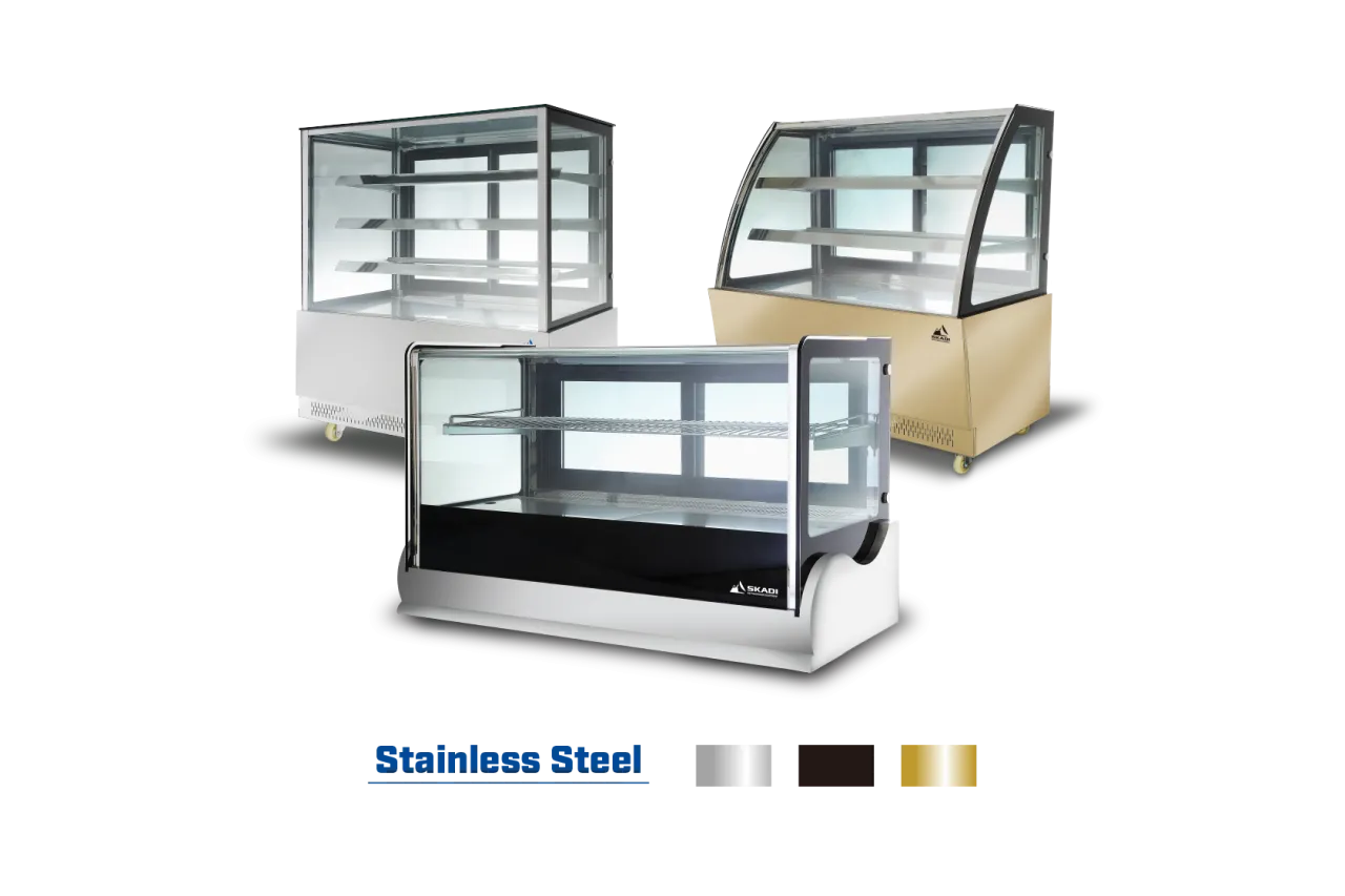 Three cake display cabinets from the Spacious Countertop Cake Display Cabinet | CTR collection, showcasing different designs and color finishes: a stainless steel, a black, and a gold-toned cabinet. Each has multiple shelves for product display, offering versatile options for bakery or café use.