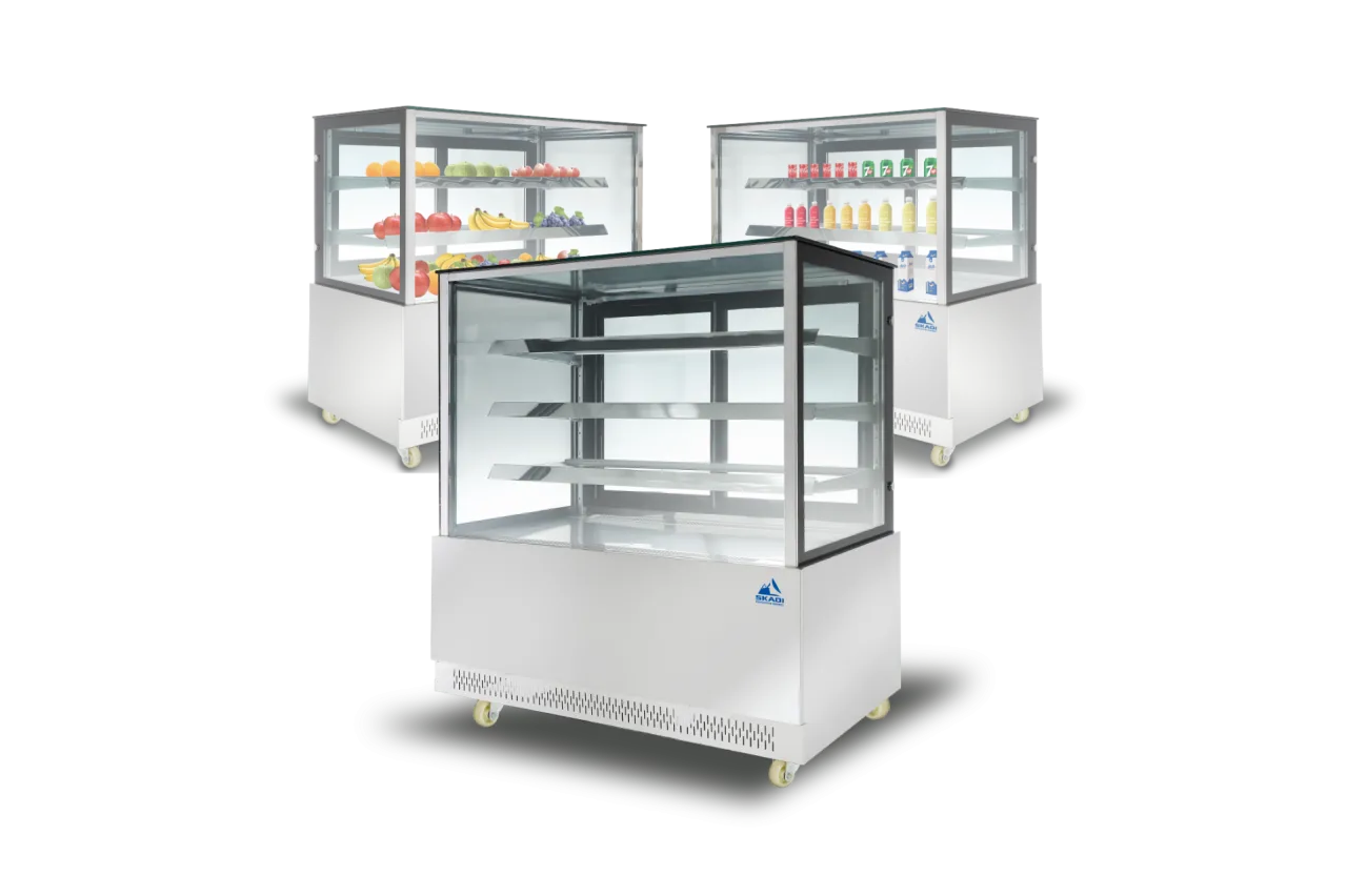 Image of three transparent glass cake display showcases filled with fresh produce and beverages. Each unit emphasizes the spacious and clear shelving for the [Transparent Glass Cake Display Showcase | PNR-T].