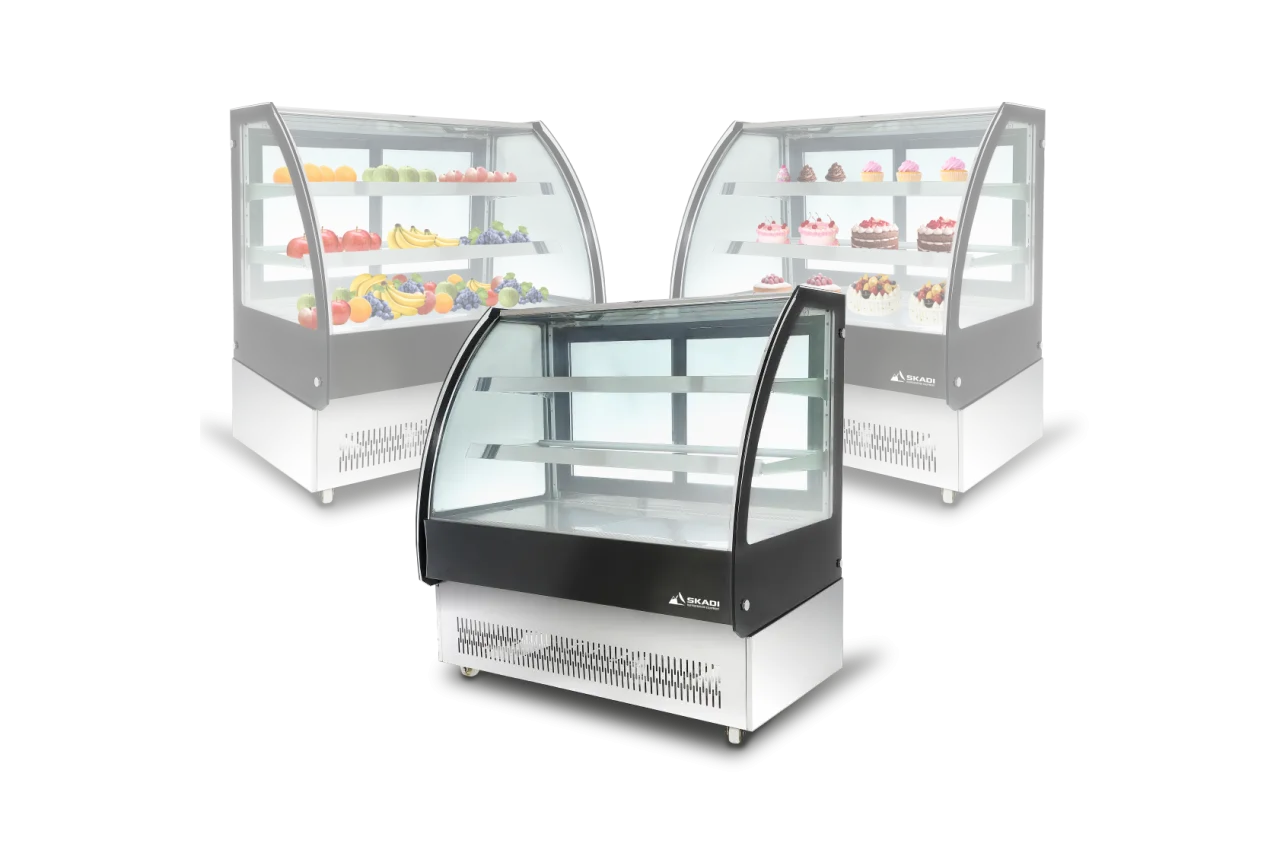 Three Curved Pastry Display Showcase | ORC-D units displaying assorted fruits and pastries. The showcases have curved glass fronts and multiple shelves for organized display.