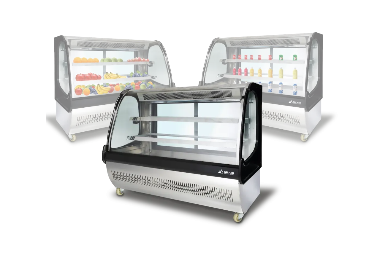 Three units of Spacious Curved Glass Commercial Cake Display Cabinet | XRC-D, each displaying various products like fresh fruits and beverages, showcasing its versatility for different retail environments.